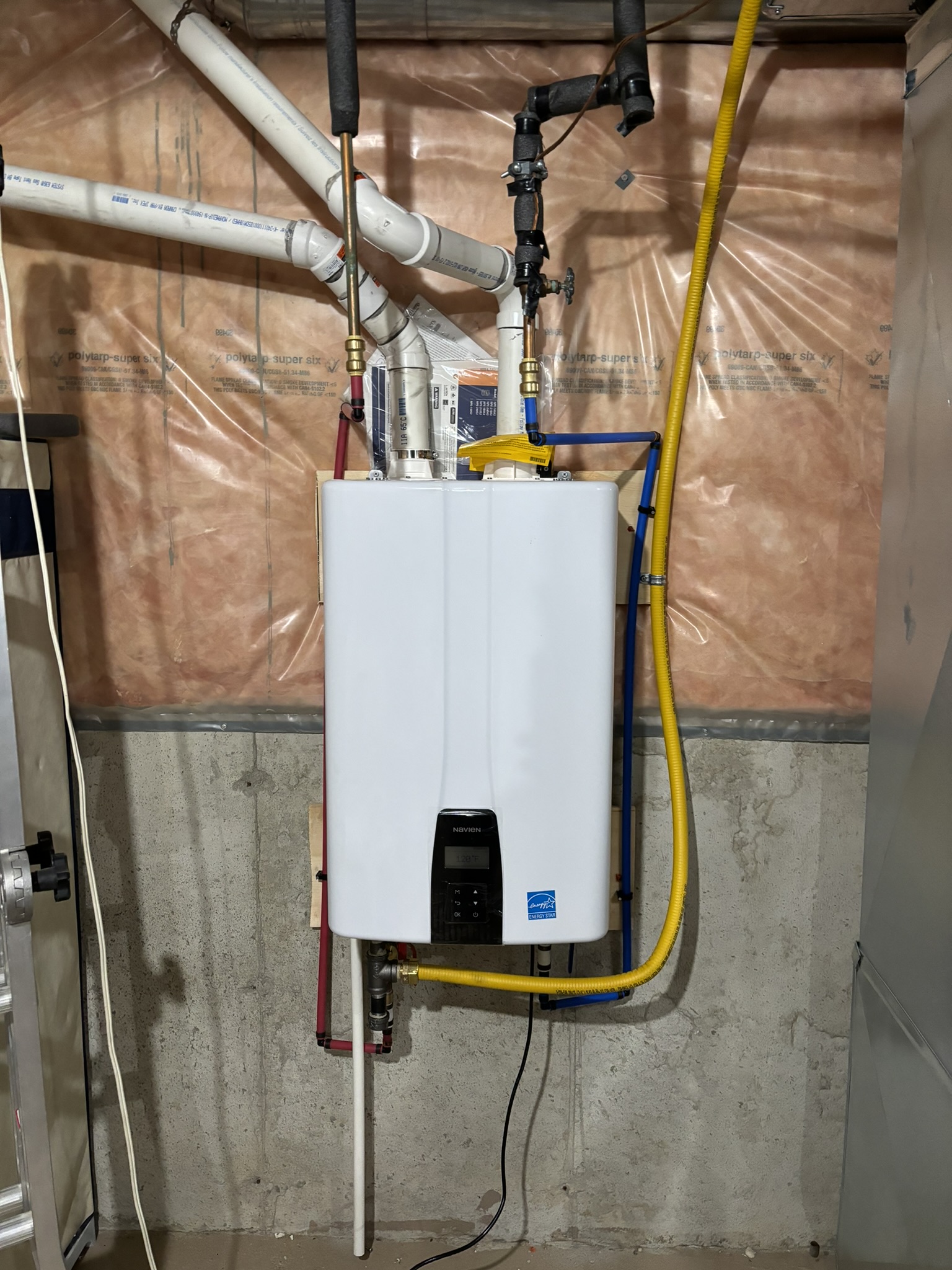 Navien tankless water heater installation by Epsilon Mechanical in Toronto basement