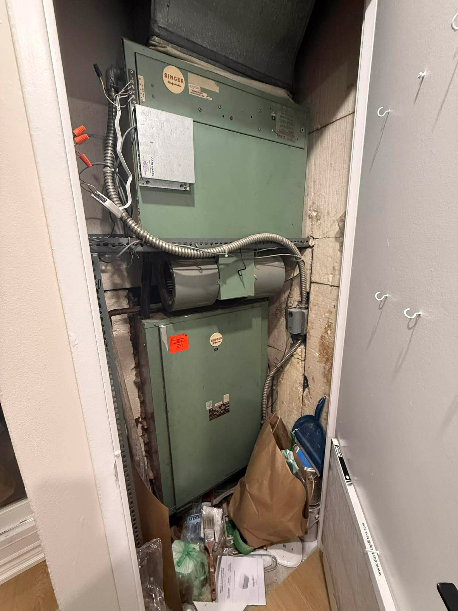 Singer vertical through-wall HVAC unit in a Toronto building