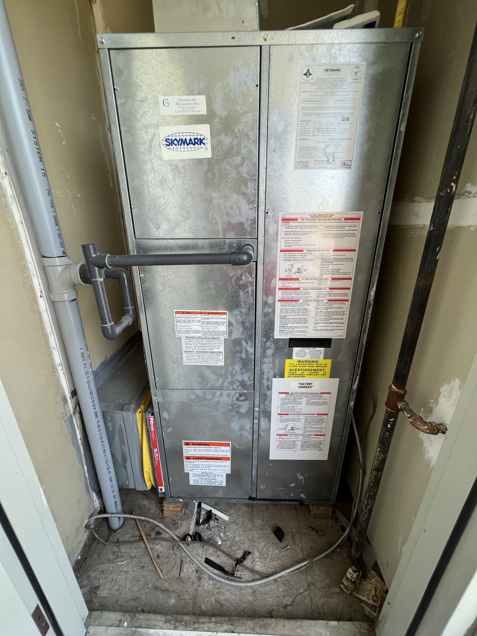 Skymark HVAC unit serviced by Epsilon Mechanical in a Toronto condo mechanical room