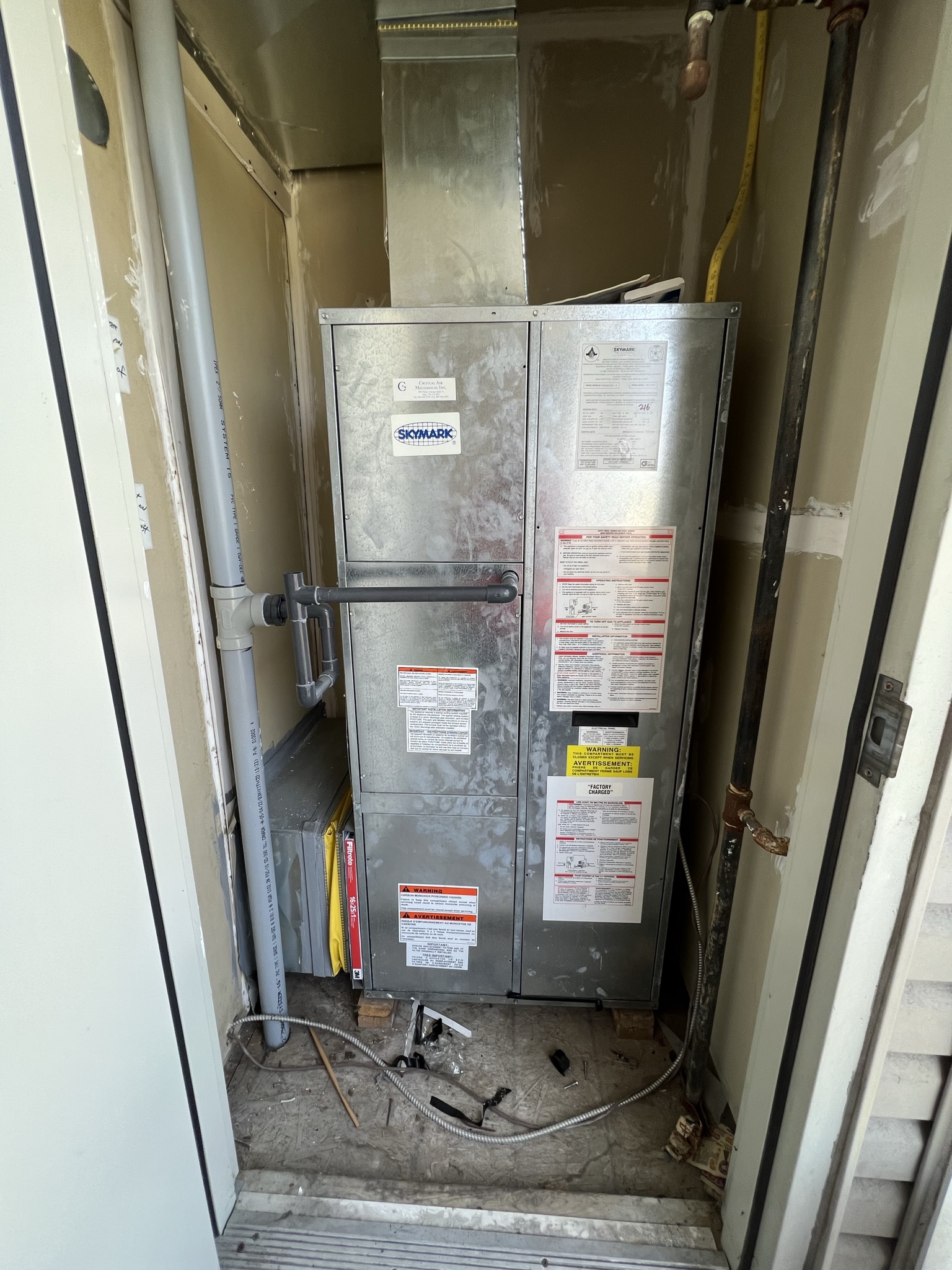 Discontinued Skymark HVAC unit inside a Toronto condo requiring retrofit or replacement by Epsilon Mechanical